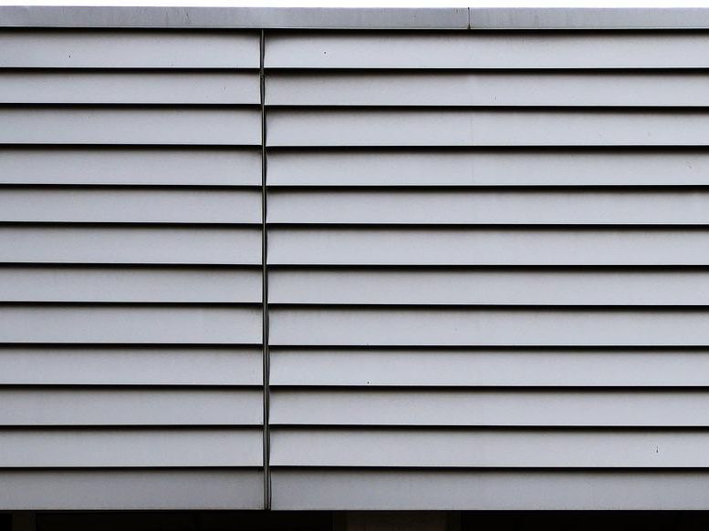Hallenprofis - Stahlbau Leistungen - Fassadenverkleidungen aus Metall